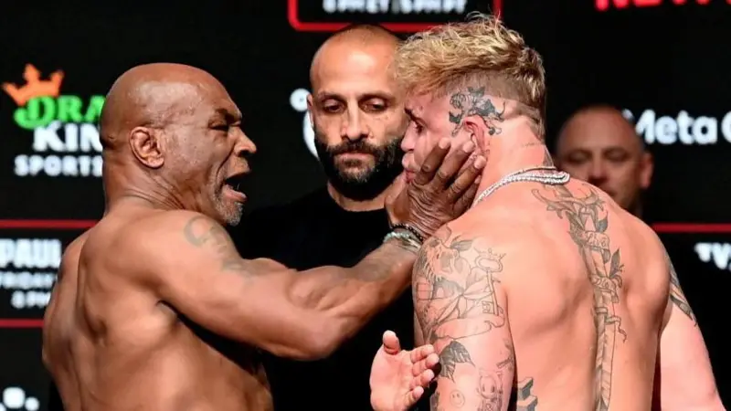 Veteran Boxer, Tyson Slaps Jake Paul At Chaotic Weigh-in