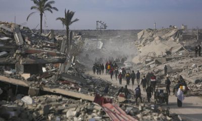 Palestinians Trek Across Rubble To Return To Their Homes As Gaza Ceasefire Takes Hold