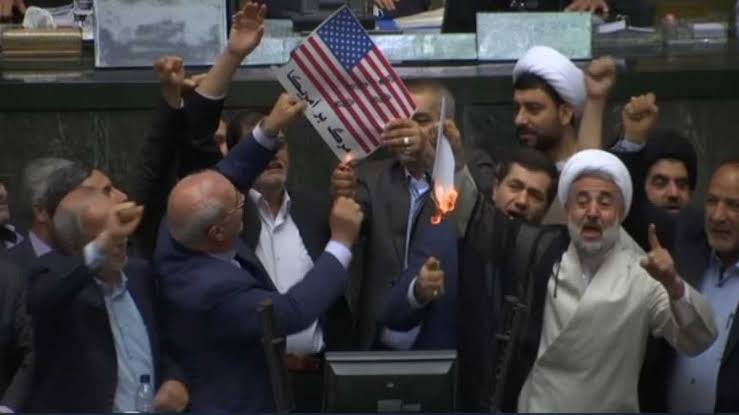 Iran Parliament Burn American Flag, Chant ‘Death To America’ Amid Israel Conflict